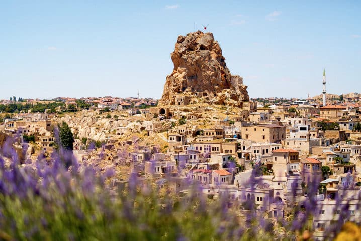 Cave hotel terrace overlooking Cappadocia at dawn